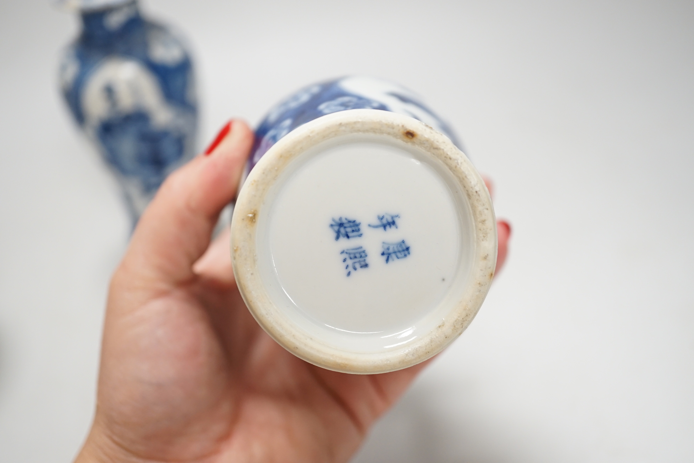 A Chinese armorial blue and white bottle vase, Qianlong/Jiaqing period, and five assorted 19th century Chinese blue and white vases, tallest 20cm; faults